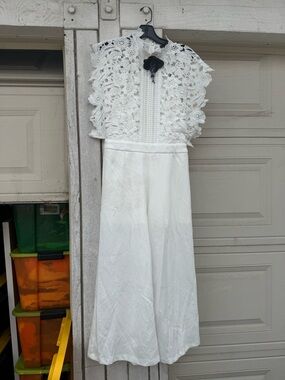 Collection B White Lace Crochet jumsuit Brand Tag